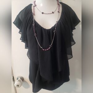 Black Ruffled Blouse with Purple Beaded Necklace